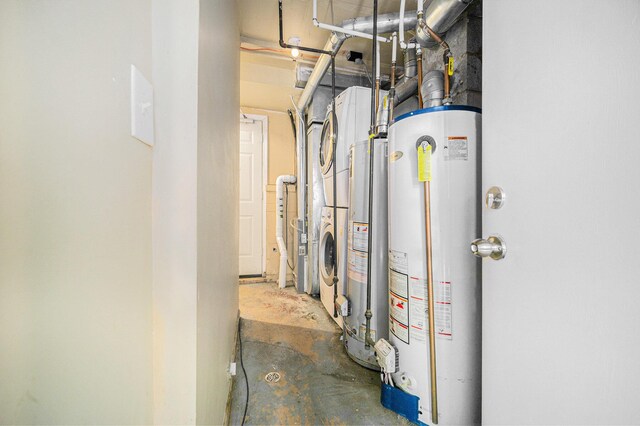 550 1st Ave, Ypsilanti, MI 48197 - utilities featuring stacked washer / dryer and gas water heater