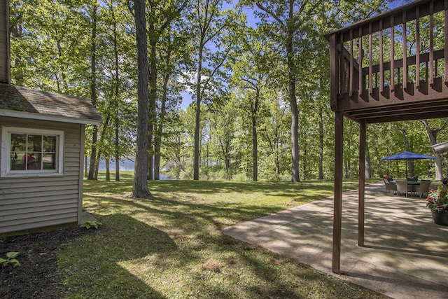 15842 Portage Rd, Vicksburg, MI 49097 - view of grassy yard with a patio and a water view
