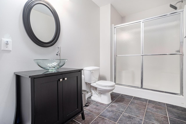 15842 Portage Rd, Vicksburg, MI 49097 - full bath featuring toilet, a stall shower, vanity, and tile patterned flooring