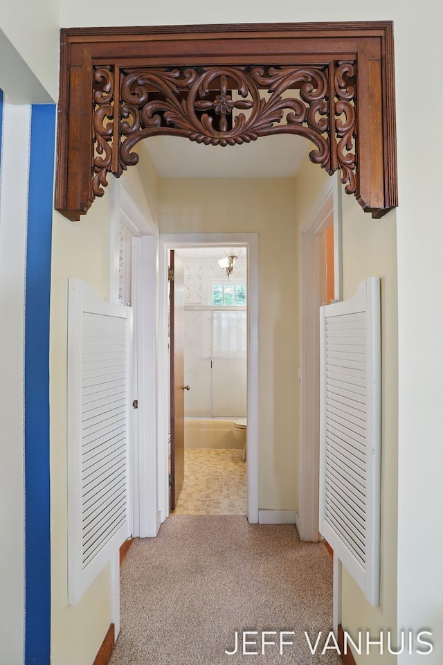 6789 W 76th St, Baldwin, MI 49304 - hall with light colored carpet and baseboards