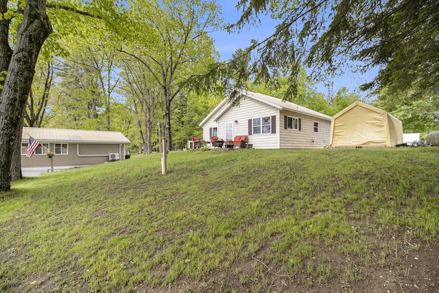 5729 N Bass Lake Rd, Irons, MI 49644 - view of grassy yard