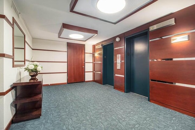 1050 Wall St Unit 2C, Ann Arbor, MI 48105 - corridor featuring elevator