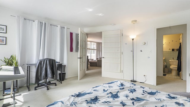 1050 Wall St Unit 2C, Ann Arbor, MI 48105 - bedroom with carpet floors and ensuite bath
