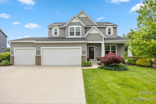 12036 Harvest Home Dr, Lowell, MI 49331 - craftsman-style house with board and batten siding, a front lawn, driveway, stone siding, and an attached garage