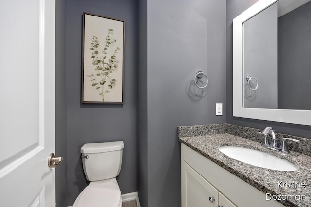 12036 Harvest Home Dr, Lowell, MI 49331 - bathroom featuring vanity and toilet