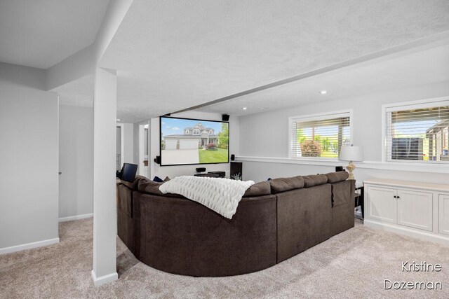 12036 Harvest Home Dr, Lowell, MI 49331 - living area with light carpet, baseboards, and recessed lighting