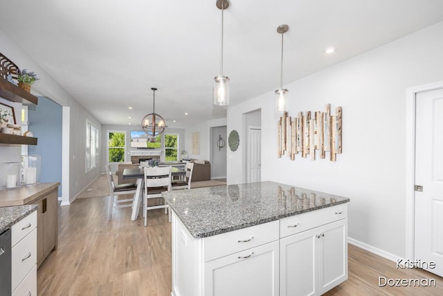 12036 Harvest Home Dr, Lowell, MI 49331 - kitchen with light wood-type flooring, baseboards, white cabinets, and recessed lighting