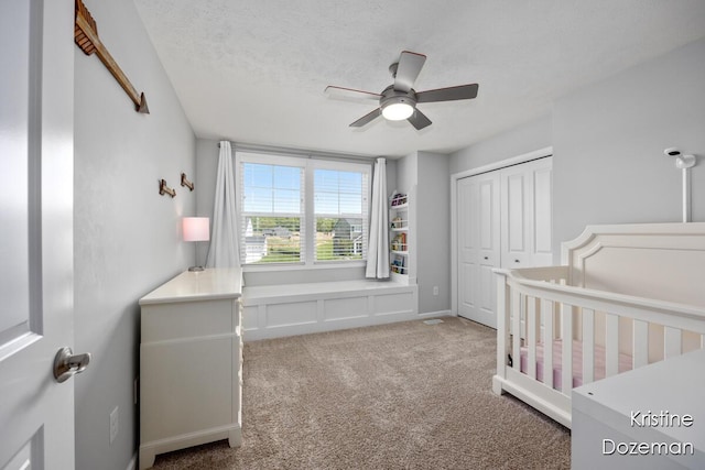 12036 Harvest Home Dr, Lowell, MI 49331 - bedroom featuring a closet, carpet floors, and ceiling fan