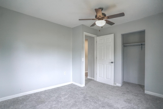 879 Carberry Rd, Niles, MI 49120 - unfurnished bedroom featuring carpet flooring, a closet, and ceiling fan