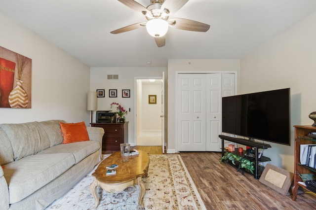 9285 Nature View Ln, Ypsilanti, MI 48197 - living area with wood finished floors and a ceiling fan