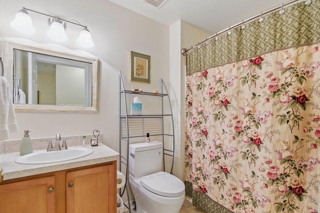 9285 Nature View Ln, Ypsilanti, MI 48197 - bathroom with vanity, toilet, and a shower with shower curtain
