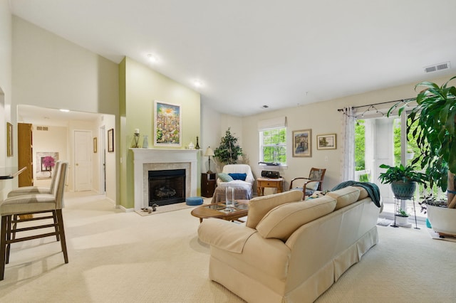 9285 Nature View Ln, Ypsilanti, MI 48197 - living area with carpet, vaulted ceiling, a fireplace, baseboards, and recessed lighting