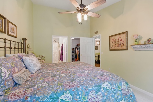 9285 Nature View Ln, Ypsilanti, MI 48197 - carpeted bedroom featuring high vaulted ceiling, a spacious closet, ceiling fan, and baseboards