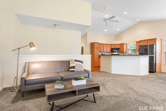 3107 Rain Tree Ct Unit 36, Hudsonville, MI 49426 - living room featuring light colored carpet, baseboards, a ceiling fan, high vaulted ceiling, and recessed lighting