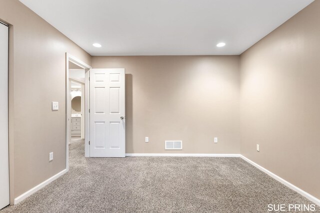 3107 Rain Tree Ct Unit 36, Hudsonville, MI 49426 - carpeted spare room with baseboards and recessed lighting