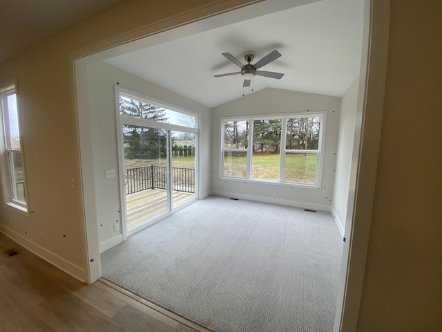 2583 Ravines Trail Dr SW, Byron Center, MI 49315 - unfurnished sunroom with lofted ceiling