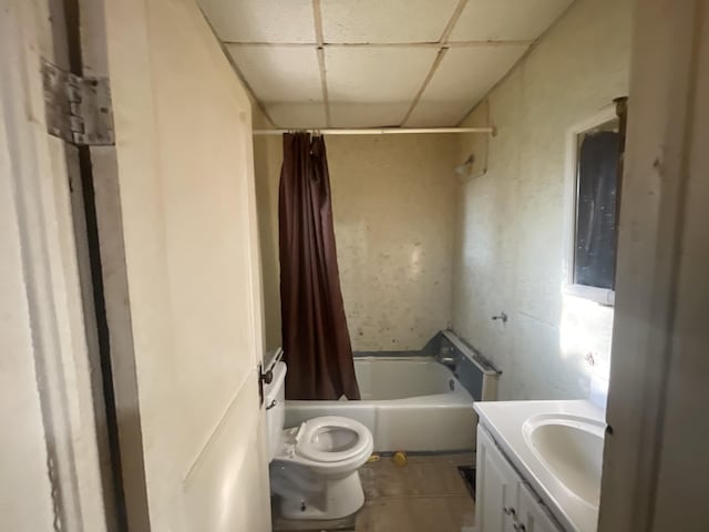 2645 Howden St, Muskegon Heights, MI 49444 - bathroom with a paneled ceiling, vanity, shower / bath combo with shower curtain, and tile patterned floors