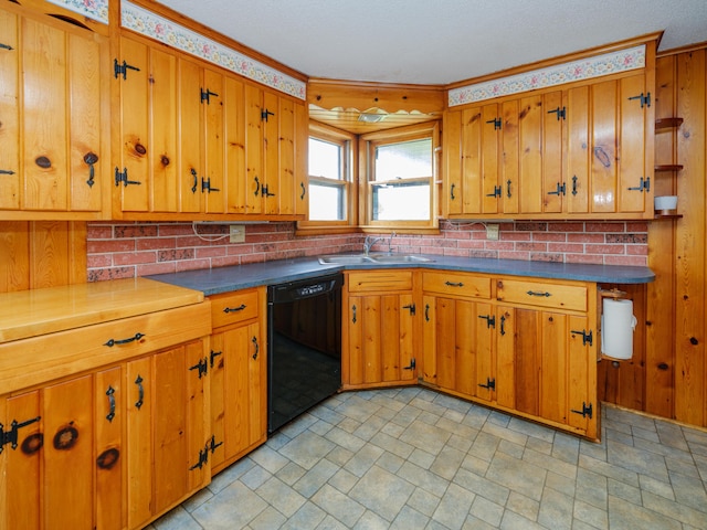 12391 Sunset Dr, Plainwell, MI 49080 - kitchen with dishwasher, a sink, stone finish floors, brown cabinets, and crown molding