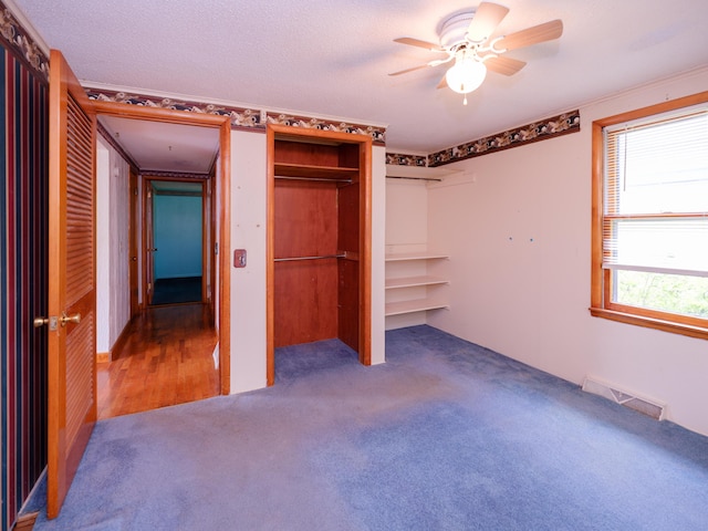 12391 Sunset Dr, Plainwell, MI 49080 - unfurnished bedroom featuring carpet floors, attic access, and ceiling fan