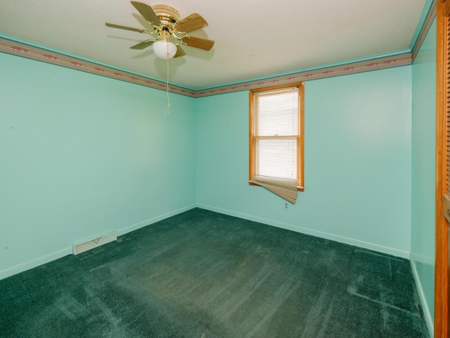 12391 Sunset Dr, Plainwell, MI 49080 - empty room with dark carpet, a ceiling fan, and baseboards