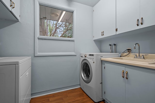 1119 Wesaw Rd, Niles, MI 49120 - laundry area with cabinet space, dark wood-type flooring, and washer and dryer