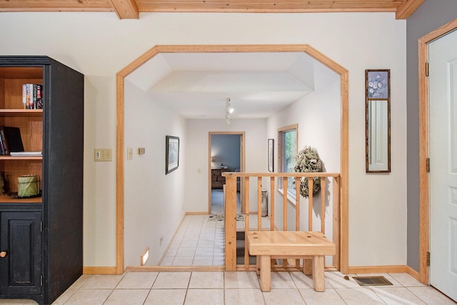 6818 W Vesper Dr, Ludington, MI 49431 - corridor featuring light tile patterned floors and baseboards