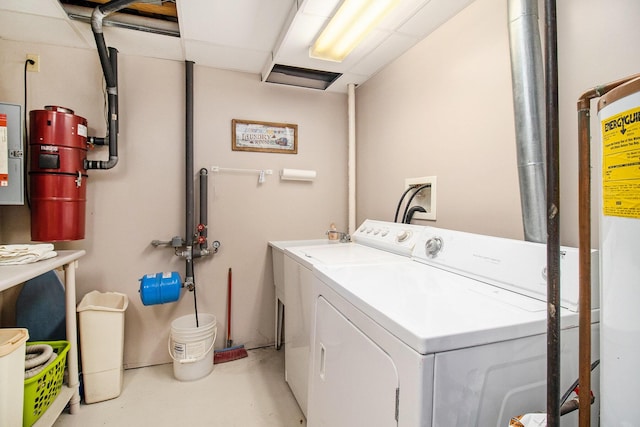 6818 W Vesper Dr, Ludington, MI 49431 - washroom with washing machine and dryer