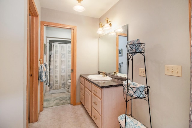 6818 W Vesper Dr, Ludington, MI 49431 - full bathroom featuring toilet, vanity, and a shower with curtain