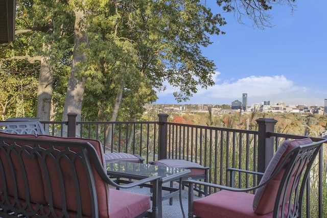 226 Sunset Ave NW, Grand Rapids, MI 49504 - wooden deck featuring outdoor dining space
