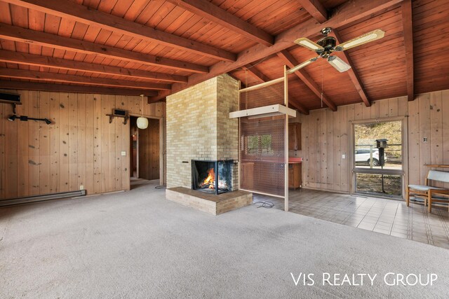 17933 N Shore Estates Rd, Spring Lake, MI 49456 - unfurnished living room featuring wood ceiling, wooden walls, a brick fireplace, carpet flooring, and ceiling fan