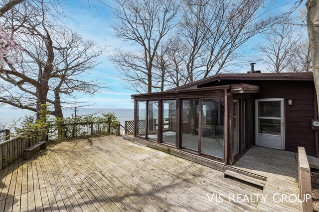 17933 N Shore Estates Rd, Spring Lake, MI 49456 - wooden deck featuring a water view