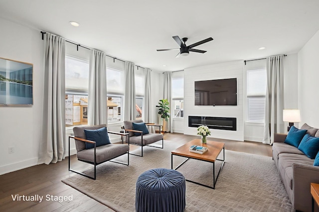 331 Honey Tree Way, Ann Arbor, MI 48103 - living area featuring a ceiling fan, wood finished floors, recessed lighting, and a large fireplace