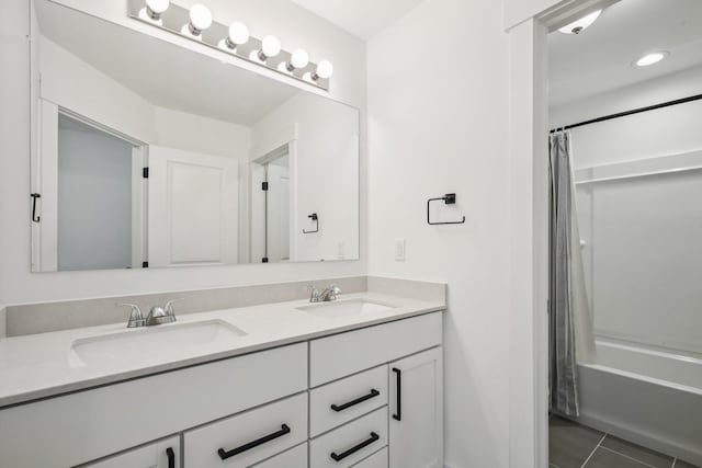 331 Honey Tree Way, Ann Arbor, MI 48103 - bathroom featuring double vanity, shower / tub combo with curtain, and tile patterned flooring