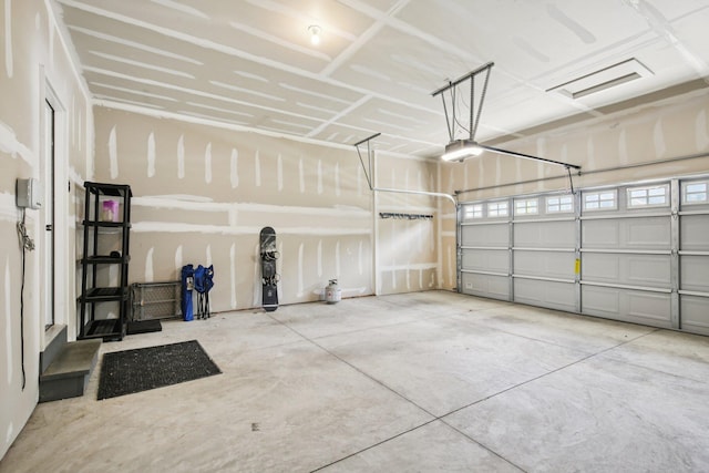 331 Honey Tree Way, Ann Arbor, MI 48103 - garage featuring a garage door opener