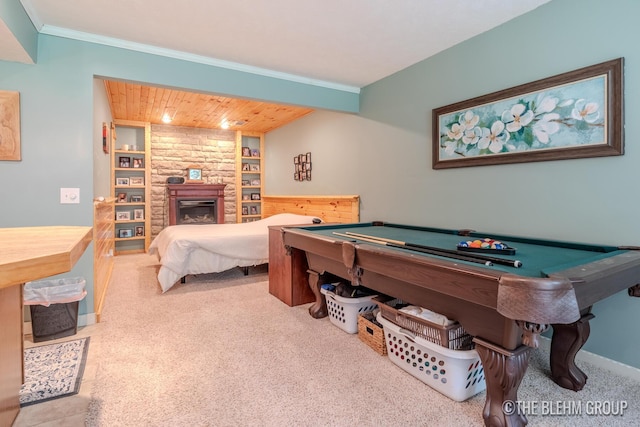 1705 Fritz St, Marne, MI 49435 - carpeted bedroom with a stone fireplace, pool table, ornamental molding, and wooden ceiling