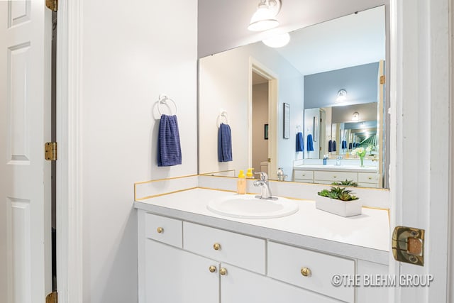 1705 Fritz St, Marne, MI 49435 - bathroom featuring vanity and toilet