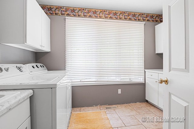 1705 Fritz St, Marne, MI 49435 - laundry room with cabinet space and washing machine and dryer