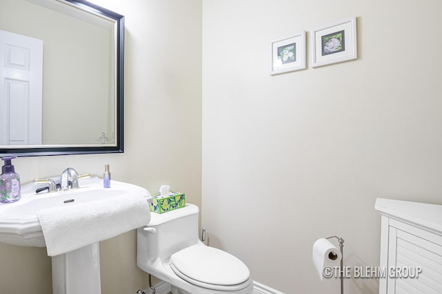 1705 Fritz St, Marne, MI 49435 - bathroom featuring toilet and a sink