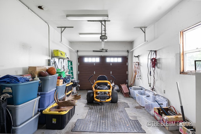 1705 Fritz St, Marne, MI 49435 - garage featuring a garage door opener