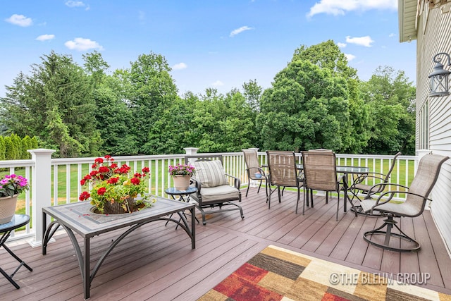 1705 Fritz St, Marne, MI 49435 - wooden terrace with outdoor dining area