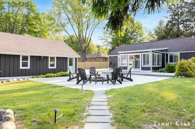 3686 64th St, Holland, MI 49423 - view of yard featuring a patio and an outdoor fire pit