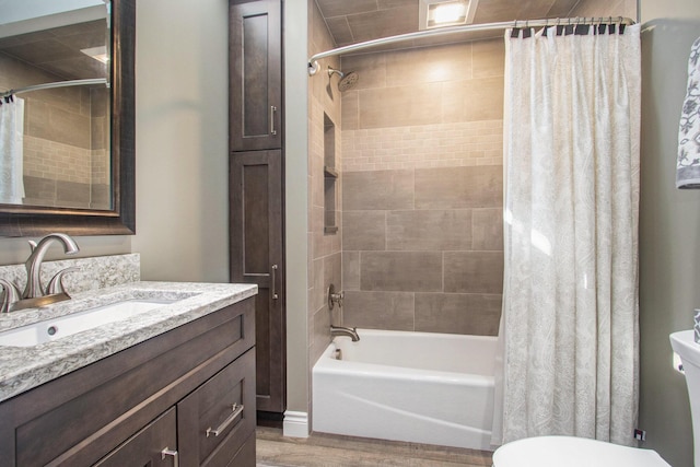 14776 Park Ct, Grand Haven, MI 49417 - full bath with shower / tub combo with curtain, wood finished floors, toilet, and vanity
