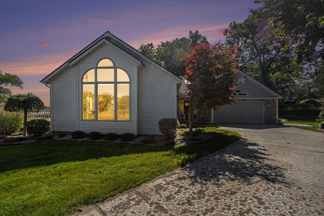 14776 Park Ct, Grand Haven, MI 49417 - single story home featuring concrete driveway, a yard, and an attached garage