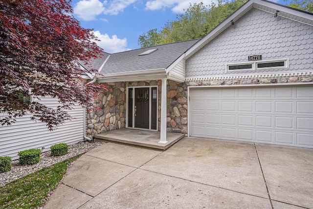 14776 Park Ct, Grand Haven, MI 49417 - view of front of house featuring stone siding, concrete driveway, roof with shingles, and a garage