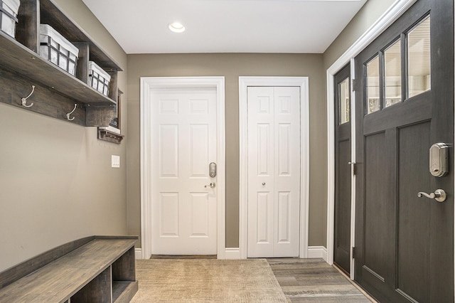 14776 Park Ct, Grand Haven, MI 49417 - mudroom with recessed lighting, baseboards, and wood finished floors