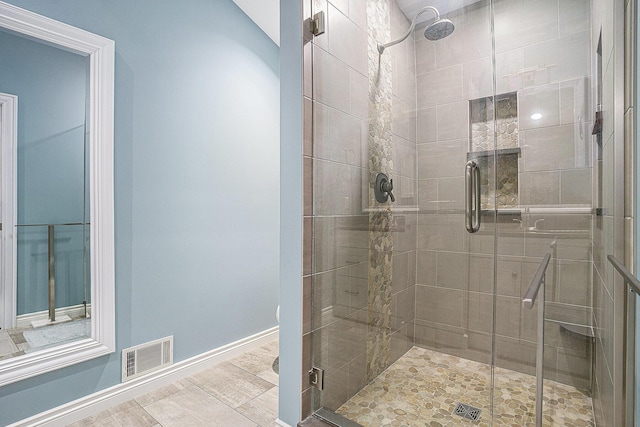 14776 Park Ct, Grand Haven, MI 49417 - bathroom with a shower stall, baseboards, toilet, and wood finished floors