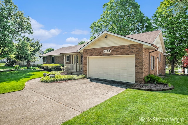 4124 Cummings Ct NW, Grand Rapids, MI 49534 - ranch-style house with an attached garage, brick siding, concrete driveway, and a front yard