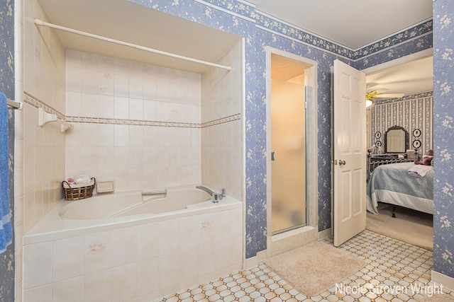 4124 Cummings Ct NW, Grand Rapids, MI 49534 - ensuite bathroom with wallpapered walls, a stall shower, a garden tub, and a ceiling fan