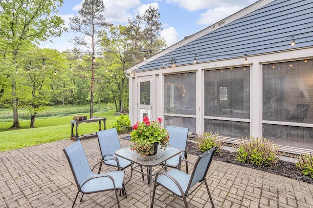 5340 Squires Manor Rd, Jackson, MI 49201 - view of patio / terrace with a sunroom and outdoor dining space