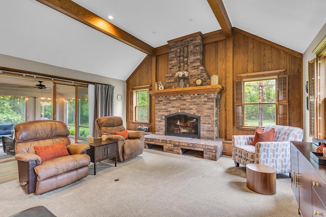 5340 Squires Manor Rd, Jackson, MI 49201 - carpeted living room with wooden walls, a fireplace, and ceiling fan